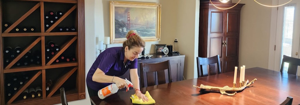 A picture of our staff cleaning faucets, sinks